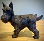 Vintage cast iron Scottish terrier cocking leg door stop in good condition