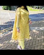 Chiffon Yellow Embroidered Shirt with kataan silk trousers and chiffon dupatta.