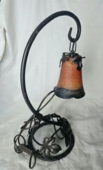 Art nouveau style metal and glass decorative lamp
