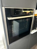NEFF Slide&Hide Built-In Electric Oven Black/Silver Touch Display