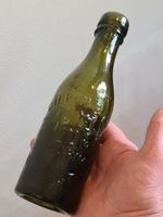 PICTORIAL HALF PINT STOUT BOTTLE FROM NEWCASTLE IN VERY GOOD CONDITION.