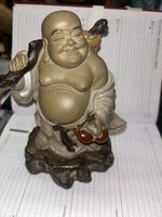 vintage Smiling buddha statue Carrying A Staff On Glazed Base 21/17cm