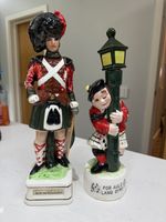 Pair of vintage Scottish themed novelty decanters / figurines.