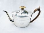 A SPLENDID GEORGE III STERLING SILVER TEAPOT- Henry Nutting, London, 1799.
