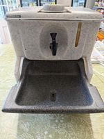 TEAL Patents Ltd Handeman Portable Hands sink.
