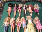 A collection of Mattel Barbie dolls (26) plus bath accessories.