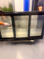 Polar GL013-06 3 Door Sliding Glass Back Bar Bottle Cooler Black, Casters