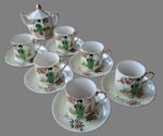 Vintage Japanese porcelain Tea Set With Geisha Design in green kimono