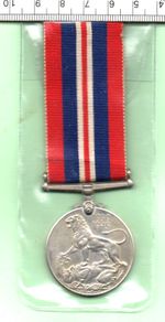 1939/1945 GENUINE WORLD WAR II MEDAL WITH RIBBON (490)