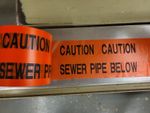 20M - CAUTION SEWER PIPE BELOW - plastic underground hazard warning tape