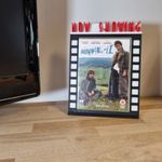 DVD and Blu-ray Now Showing Now Playing Display Stand Film DVD Bluray Movie