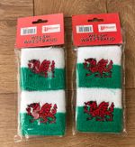 Wales Elasticated Towelling Wrist Bands. (Two Pairs)