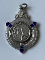 Old Irish Basketball Medal.