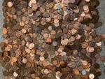 United States: 5.7 kg of 1 cent coins. Approximately $21.  USD...