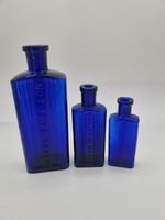 3 Oblong Blue Poison Bottles
