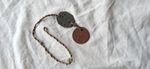 A Pair Of British Army Fibre Dog Tags With Original Neck String