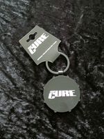 THE CURE - LOGO DRUM   METAL KEYCHAIN  OFFICIAL BAND MERCH