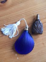 Two Beautiful Purfume Bottles One Tiger Eye One Moulded Blue Glass.