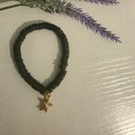 Black Beaded Stretch Slip-On Bracelet Round Beads with Gold Star Dangle Charm