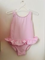 Bout’chou  12 months Baby Girl Pink Ruffled Swimsuit with bow detail on back.