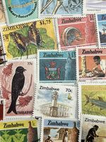 ZIMBABWE 50 Postage Stamps Used Off Paper For Collecting And Craft Projects.