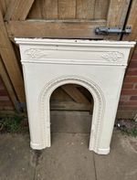 Cast iron vintage fire place With a broken mantle