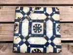 very old large highly decorated tile !