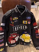 This item is a vintage M&M's NASCAR racing jacket, likely produced by JH Design