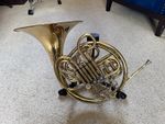 Double French Horn F/Bb with case and beginners book.
