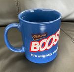 Cadbury’s Boost “It’s Slightly Rippled With A Flat Underside” Mug. Collectible.￼