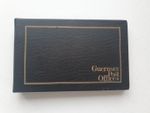Album Containing 14 Guernsey 1987-1990 Post Office Mint Presentation Packs