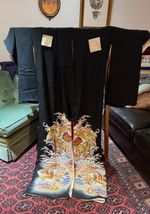 Antique black silk kimono with a beautiful auspicious design