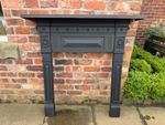 Large Victorian antique cast fire place surround log burner