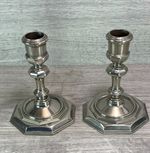 A Pair Of Silver Plated Candlesticks octagonal bases