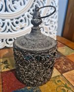 Rustic brown metal decorative Moroccan lantern with hinged door. 10.5 cms height