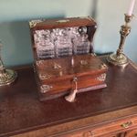 QUALITY GENTLEMEN’S  ANTIQUE OAK CASED,THREE BOTTLE GAMES TANTALUS  CIRCA 1910.