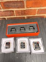 3 Reveal Calla Body Worn Cameras with the 3-way docking station.