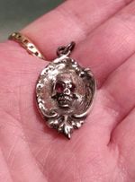 ANTIQUE VICTORIAN STERLING SILVER MEMENTO MORI SKULL PENDANT  GARNET EYES 1874