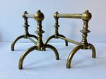 A Pair of Late Victorian 19th Century Aesthetic Movement Brass Firedogs 