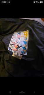 Kids Shiny Black Feathered Coat. Brand New Size Age 10 with Tags