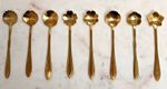 Elegant 8 pc Gold Plated tea/coffee/dessert spoon set in decorated floral design