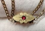 ANTIQUE GOLD FILLED SLIDER ON ~42" CHAIN WITH NO CLASP, CHIPPED RED ACCENT  N214