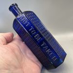 STUNNING COFFIN SHAPED VICTORIAN POISON BOTTLE VARIANT EMBOSSED NOT TO BE TAKEN
