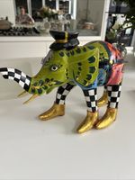 This is a handmade whimsical elephant figurine from the Tom's Drag collection