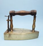 An Antique Brass Flat Iron No 5 with Opening for Hot Coals  8in X 6.5in X 4in