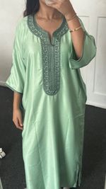 Mint green moroccan thobe with an opening pocket. One size  and oversized fit