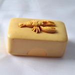 Vintage Celluloid cream delicate  pill box. Raised Lobster on top. onlong.Rare