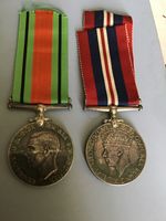 WWII 1939-1945 pair of Silver Canadian war medals c/w ribbons