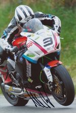 MICHAEL DUNLOP HAND SIGNED 12X8 PHOTO ISLE OF MAN TT LEGEND 1.