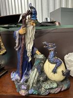 vintage wizard and dragon statue